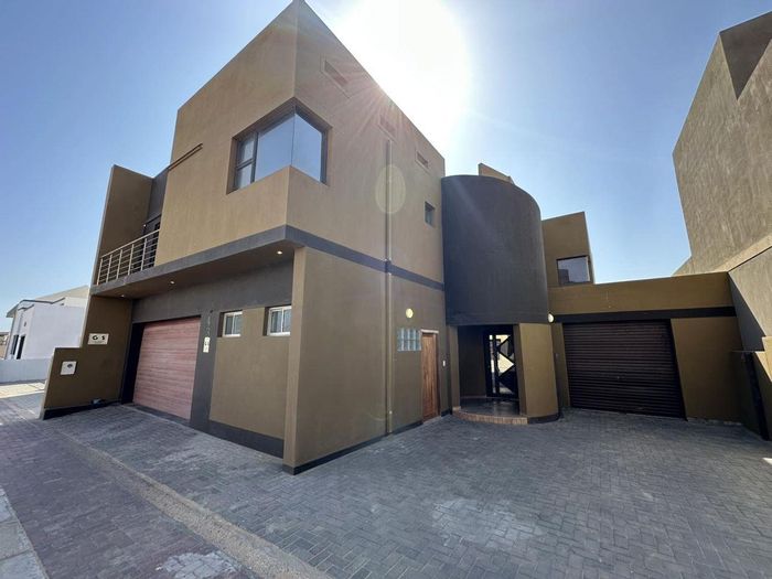 Long Beach House For Sale: 4 bedrooms, balconies, outdoor braai, Airbnb potential.