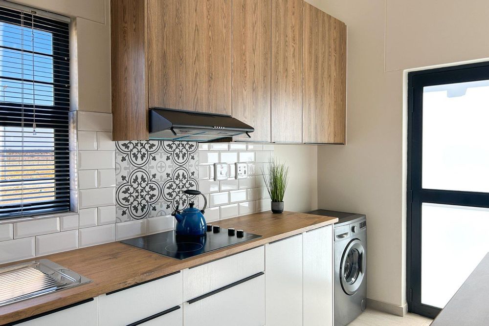 Modern kitchen with sleek kitchen island.