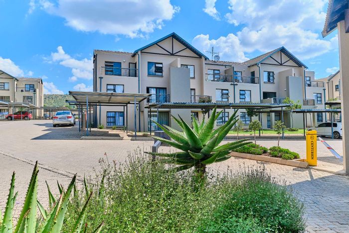 For Sale: Ruimsig Townhouse with golf course views, fiber-ready, 24-hour security.