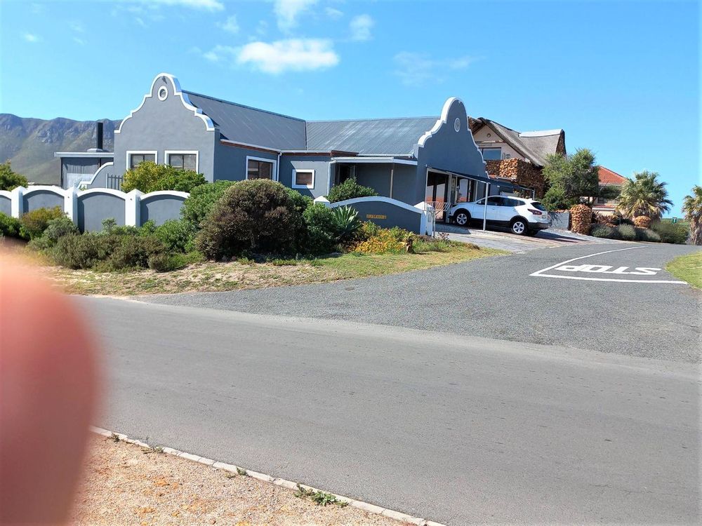 A few upmarket Houses (on the 1 corner) across the Street from us - on the side of the Mountain. Permanent Mountain View.
