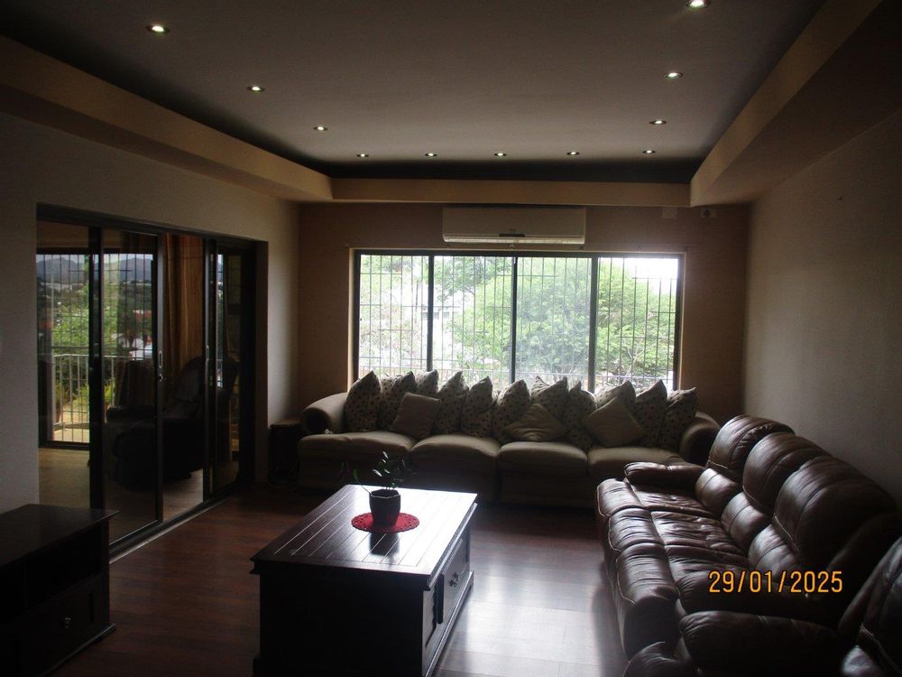 General view of the lounge area with split unit air-conditioner installation. 