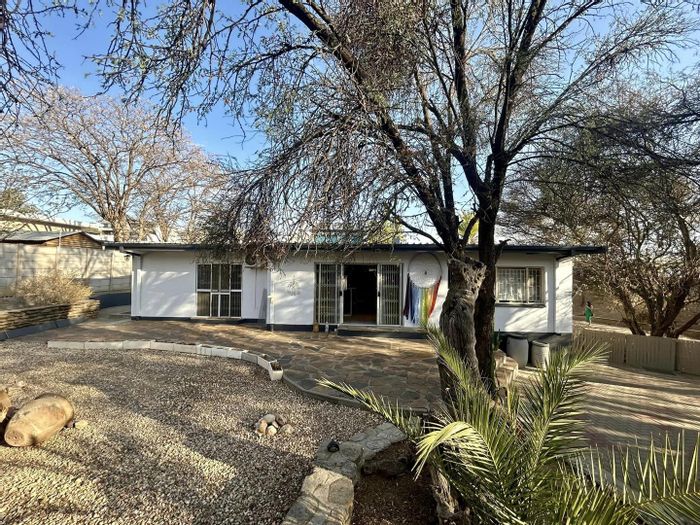 For Sale: Olympia House with 4 Bedrooms, garden, braai area, and security features.