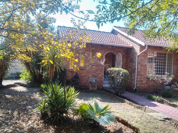 For Sale: 4-bedroom house in Klippoortje with pool, garage, and secure parking.