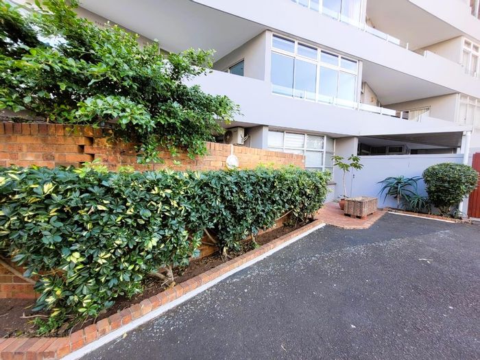 For Sale: 1-Bedroom Apartment in Umhlanga Central with garden, security, and beach access.