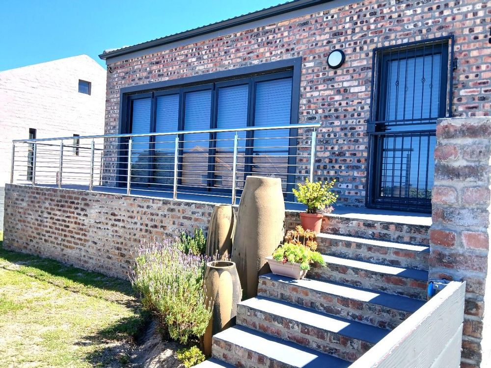 Again our huge front Balcony - with stack doors leading to Living Area (now closed).