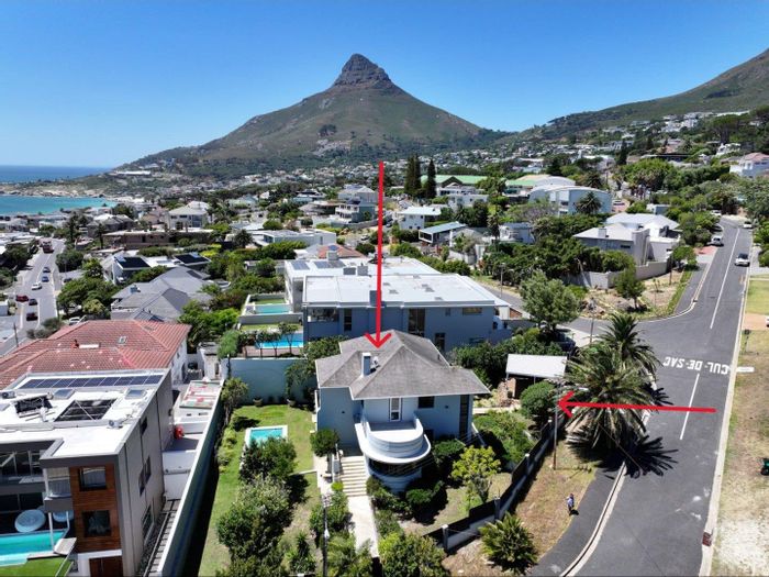 Camps Bay House For Sale: Development potential, corner plot, GR2 zoning, mountain views.