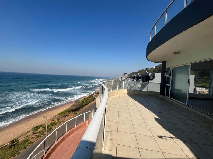 For Sale: Umdloti Beach Apartment with sea views, pool, and beach access.