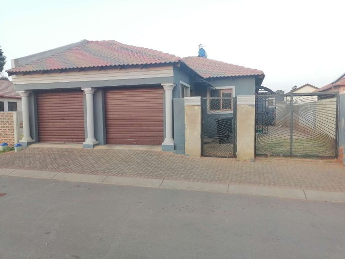 For Sale: House in Alliance with fitted kitchen, double garages, and rental flats.