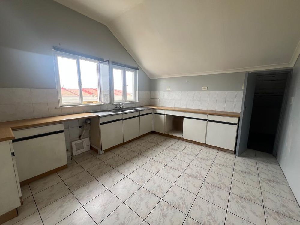 Kitchen with pantry.