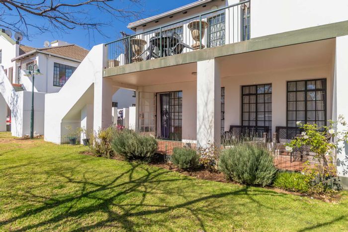 For Sale: 2-bedroom apartment in Magaliessig with garden, pool, and security.