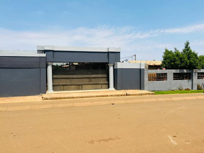 3-Bedroom House in Orange Farm For Sale with spacious living areas and business potential.