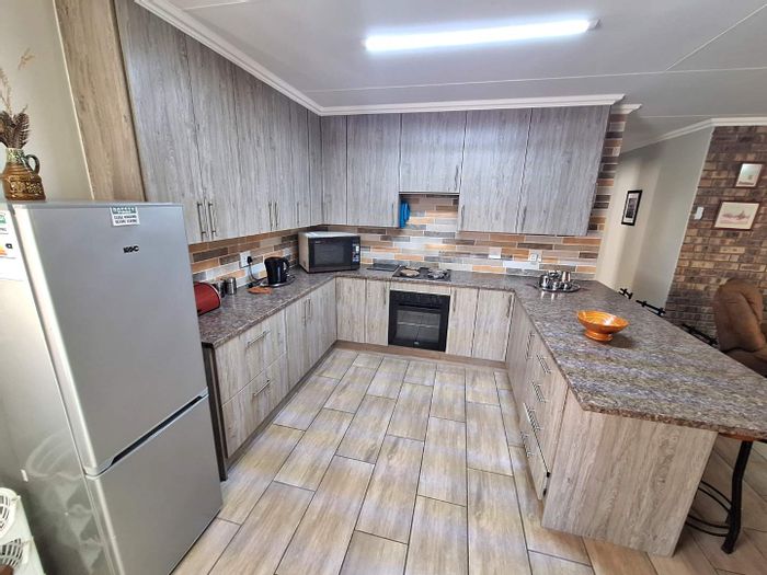 Charming Three-Bedroom House with Modern Amenities in Leeupoort Central For Sale