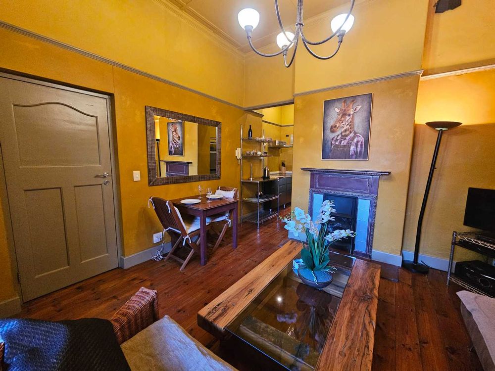 cosy sitting/eating room with fire place