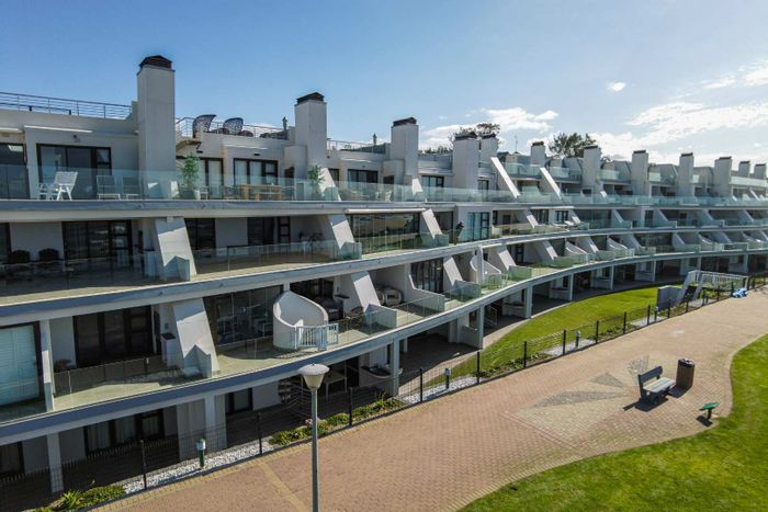 For Sale: Apartment in Hartenbos Central, 2 beds, pool, beach access, great investment.