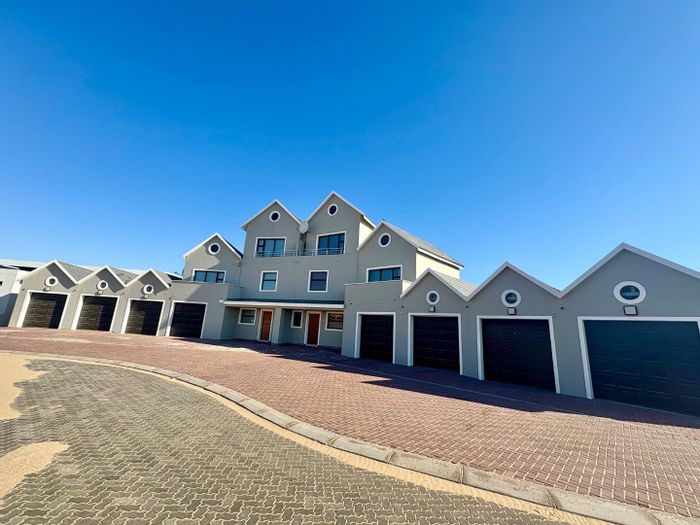 3-Bedroom Townhouse To Rent in Dolphin Beach with sea views and BBQ area.