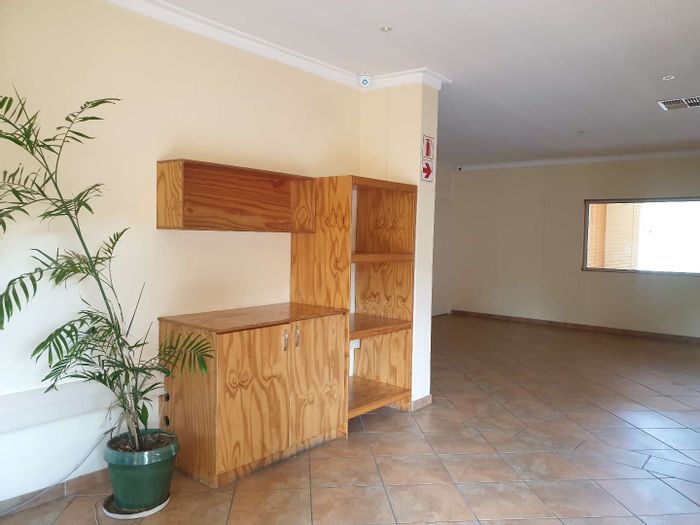 For Sale: Office in Windhoek West with multiple entrances, parking, and security features.