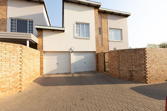 For Sale: 3 Bedroom Townhouse in Hazeldean with garden, double garage, pool access.