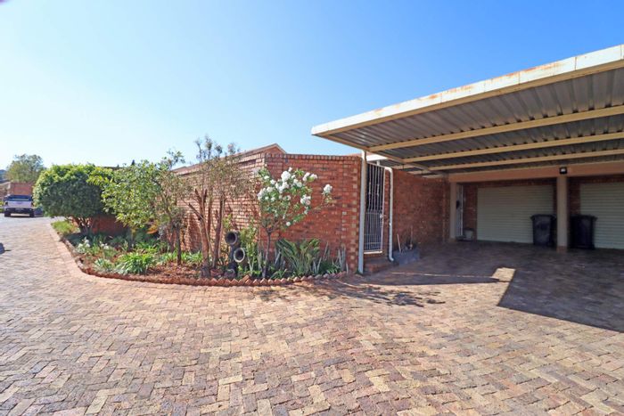 Elarduspark Townhouse For Sale: 2 Bedrooms, Private Garden, Secure Parking, Pet-Friendly.