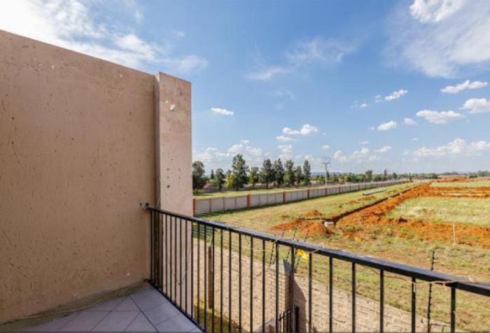 For Sale: 2-Bedroom Apartment in Alberton Central with convenient amenities and parking.
