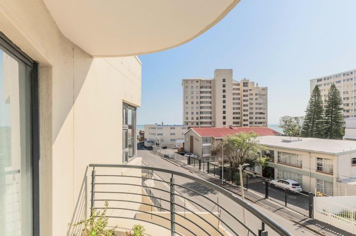 2-Bedroom Apartment For Sale in Strand South with balcony and secure parking.