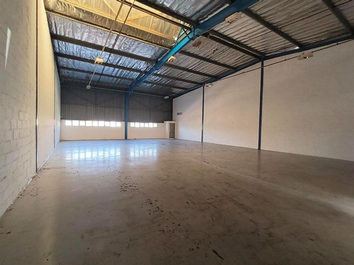 Industrial units for rent in Westmead with secure access and vehicle accommodation.