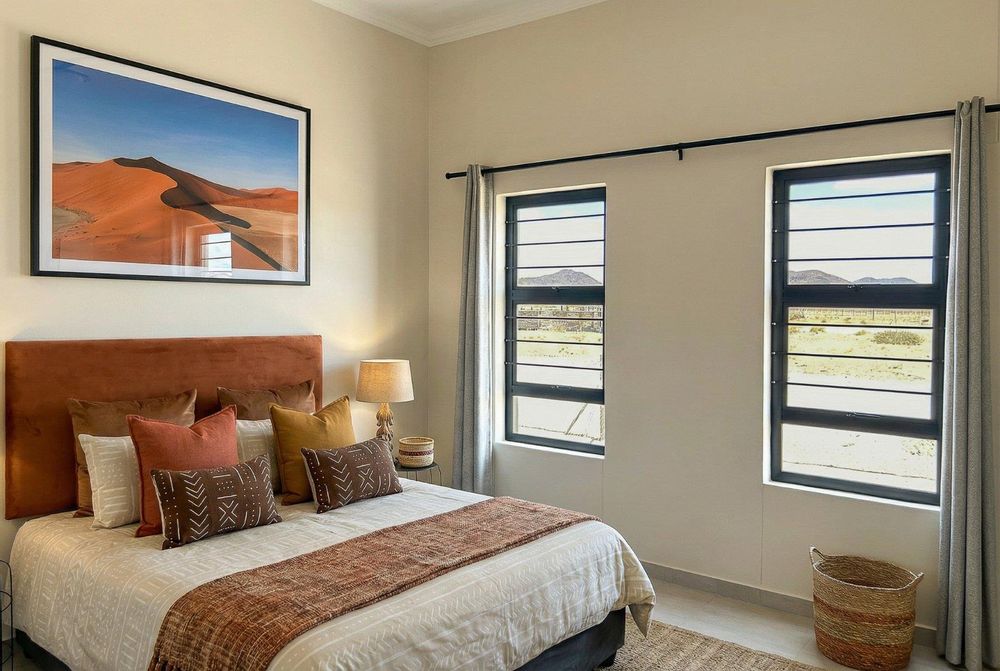 Main bedroom with plenty of built-in cupboards and ensuite bathroom.