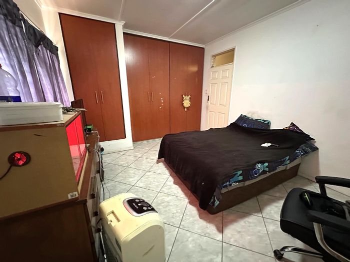 Swartkops Apartment For Sale: 3 Bedrooms, private garden, secure parking, spacious layout.