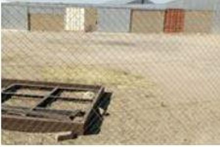 Industrial property for sale in Otjiwarongo Central with multiple barns and prepaid electricity.