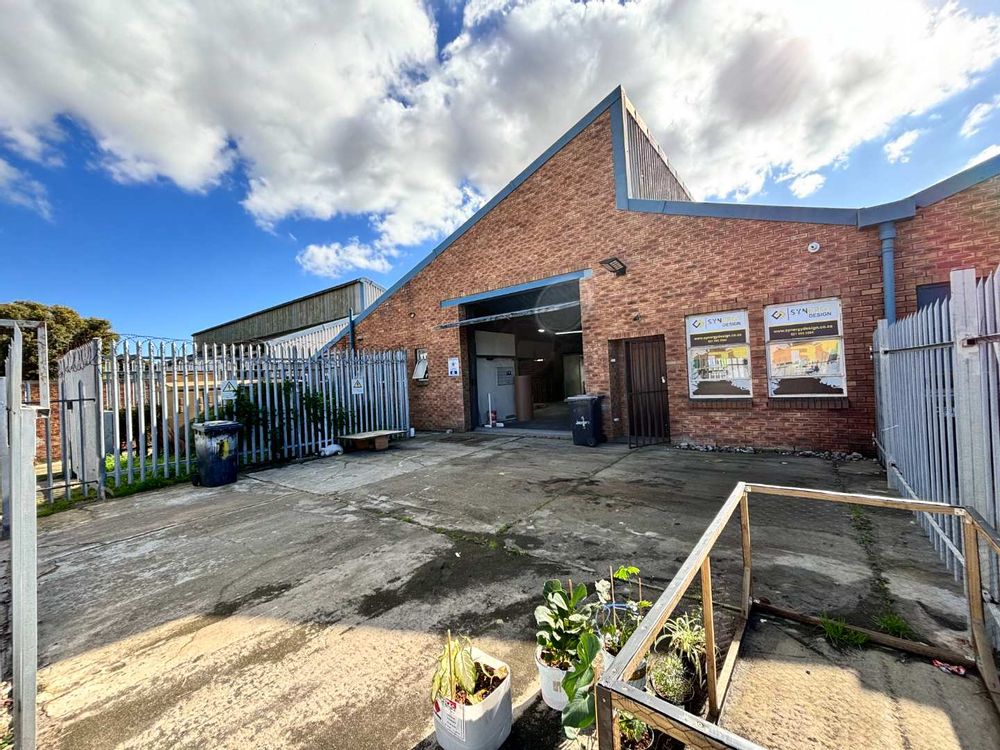 Warehouse facade with yard area