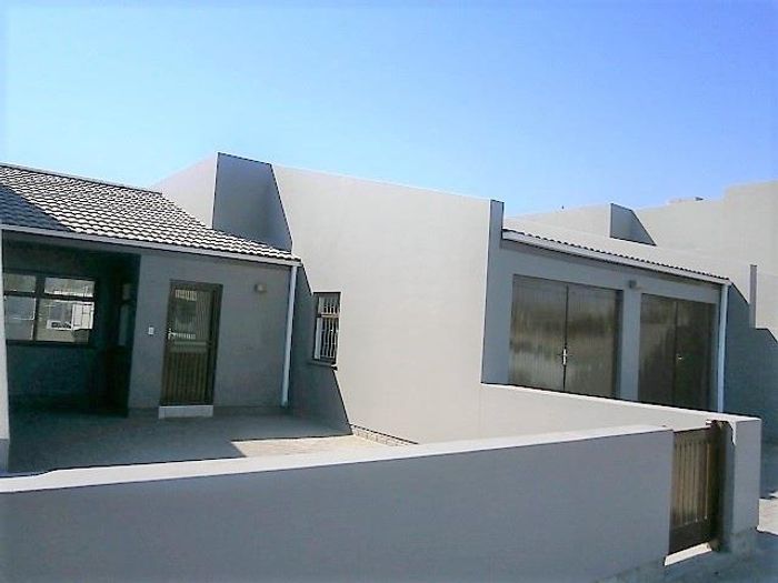 Townhouse For Sale in Walvis Bay Central: 2 bedrooms, double garage, near amenities.