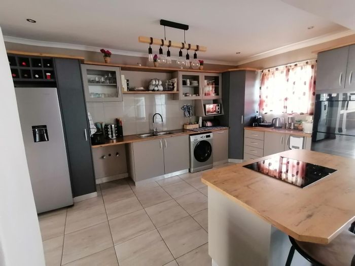 Elisenheim House For Sale: Three bedrooms, indoor braai, double garage, secure community.