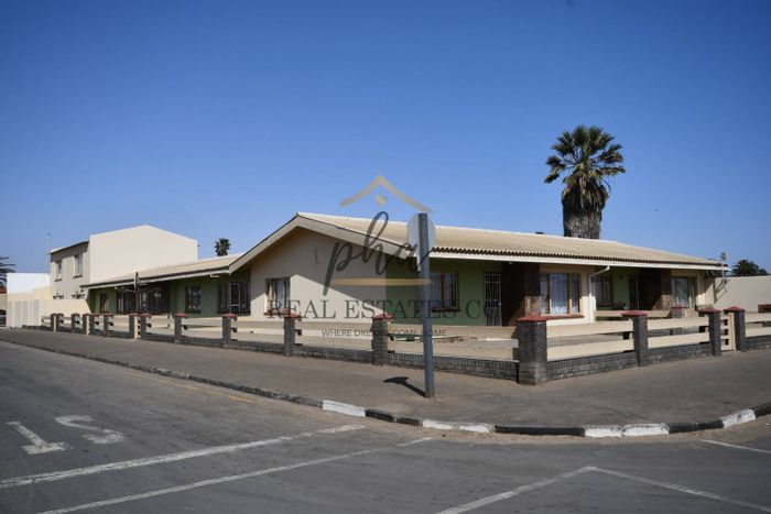 For Sale: Apartment Complex in Walvis Bay Central with 7 leased units and garages.