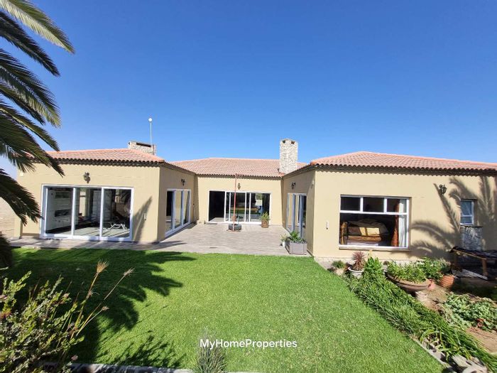 For Sale: House at Rossmund Golf Resort with study, indoor braai, and 4 bedrooms.