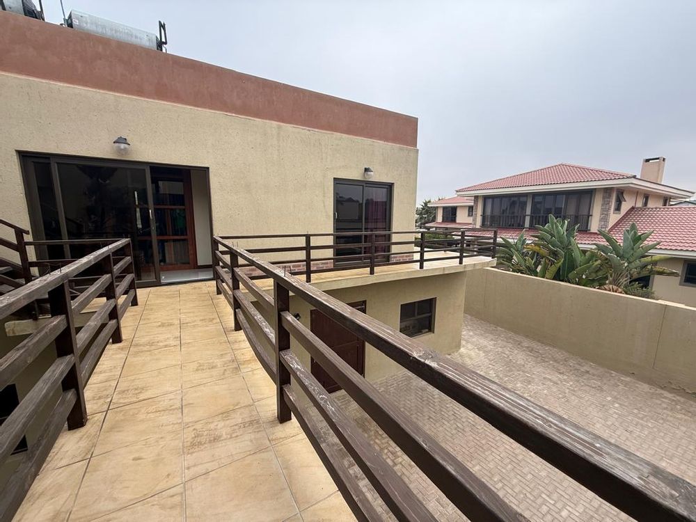 Balcony walk way between the lounge and first floor bedrooms