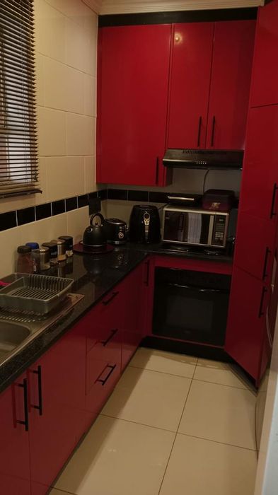 Kempton Park AH Townhouse For Sale: Two bedrooms, balcony, spacious lounge, convenient location.