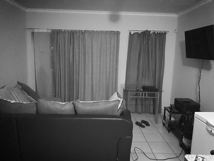 For Sale: 2-Bedroom Apartment in Okahandja Central with Balcony and Carport.