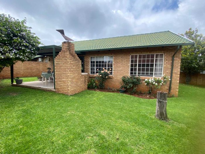 For Sale: Highveld Townhouse with large garden, double security, and ample parking.