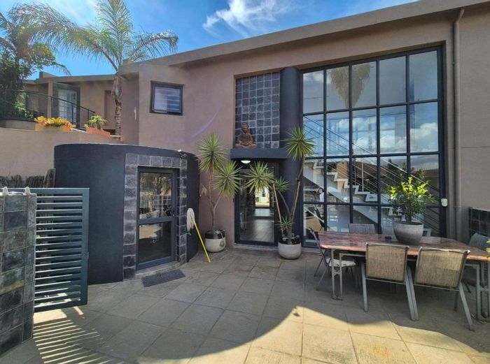 For Sale: Cluster Home in Bassonia with Scenic Views, Outdoor Spaces, and Security.