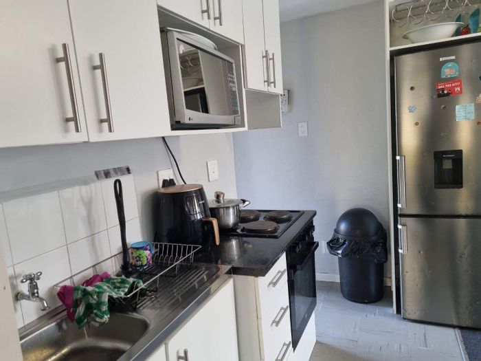 2-Bedroom Apartment For Sale in Amalinda with secure complex and play areas.