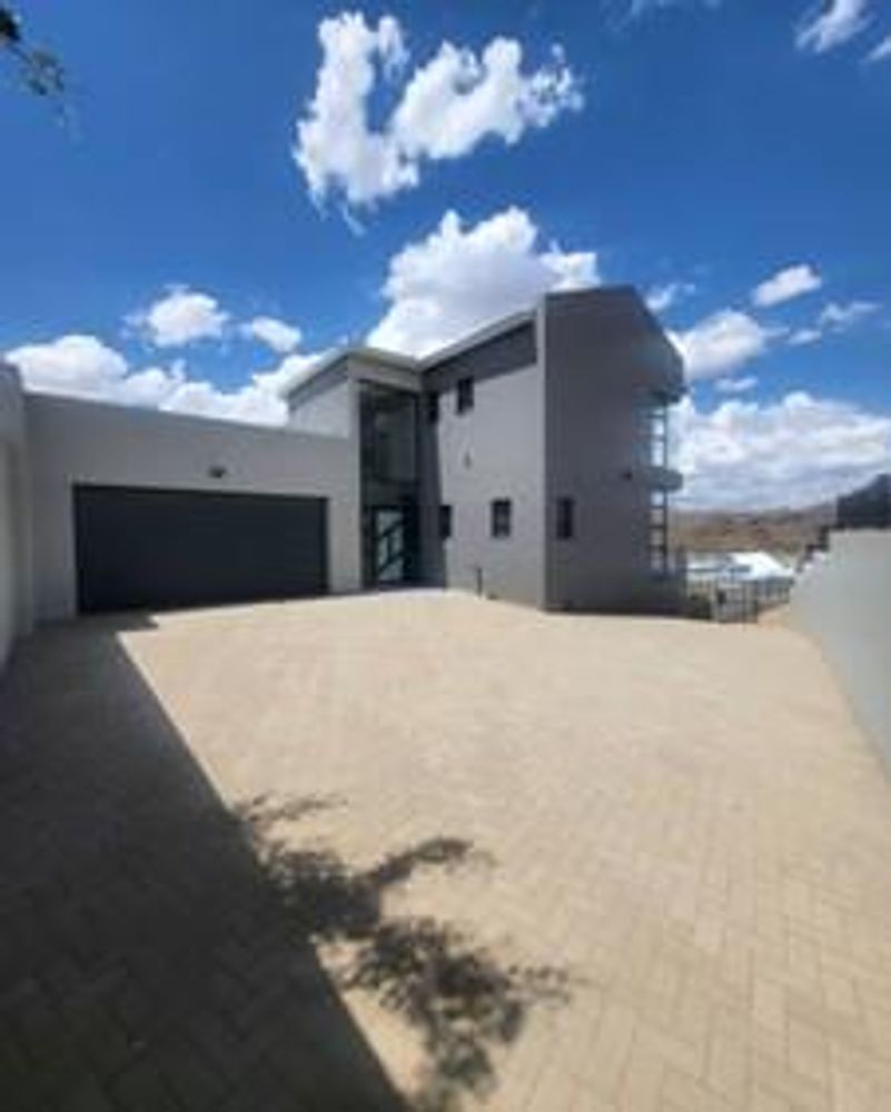 View of the garages and yard