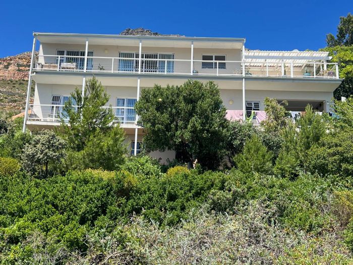 Coastal house in Simons Kloof for sale: panoramic views, dual-living potential.