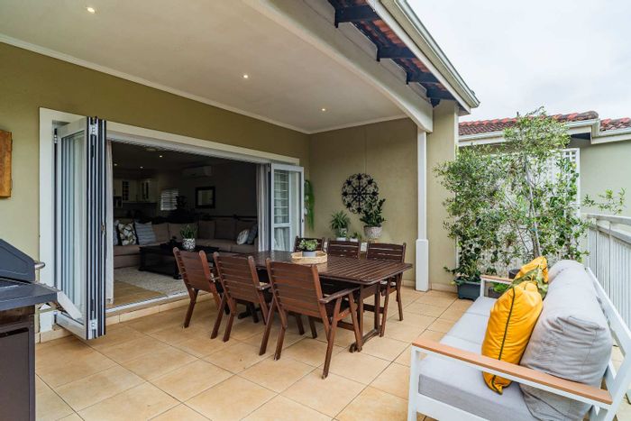 For Sale: Townhouse in Durban North Central with 4 beds, pet-friendly, water backup.