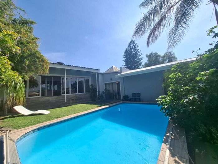 Spacious Suiderhof house with pool, flat, BBQ room, and ample parking for sale.