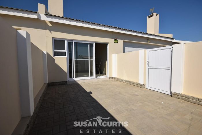 Ocean View Townhouse For Sale: 3 Bedrooms, indoor BBQ, double garage, security features.