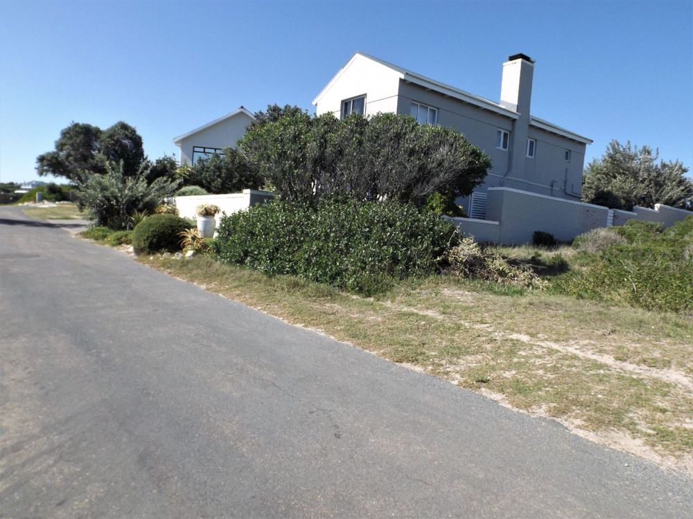 Our Plot on our right; up-market Houses on the Hermanus side.