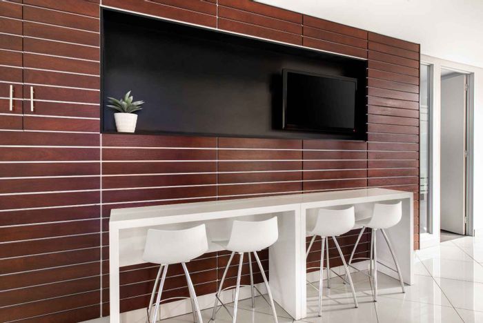 Office to Rent in Parktown: Private space, coworking area, on-site parking, networking events.