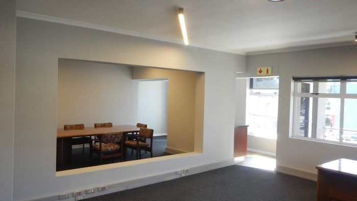 Plumstead Office To Rent: Revamped space with boardroom, balcony, and secure parking.