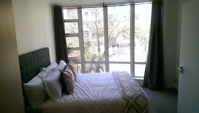 Furnished 2-bedroom apartment in Sandton Central with pool and secure parking.