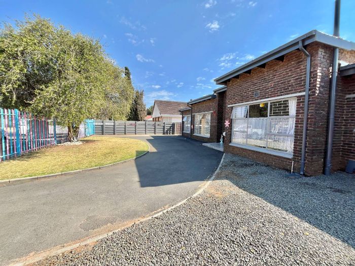 Versatile Parkrand House For Sale: Ideal for Family Living or Childcare Center.