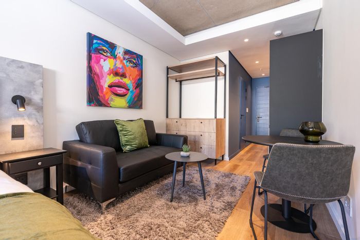 Sea Point Apartment To Rent: Wrap-around balcony, pool, pet-friendly, co-working spaces.